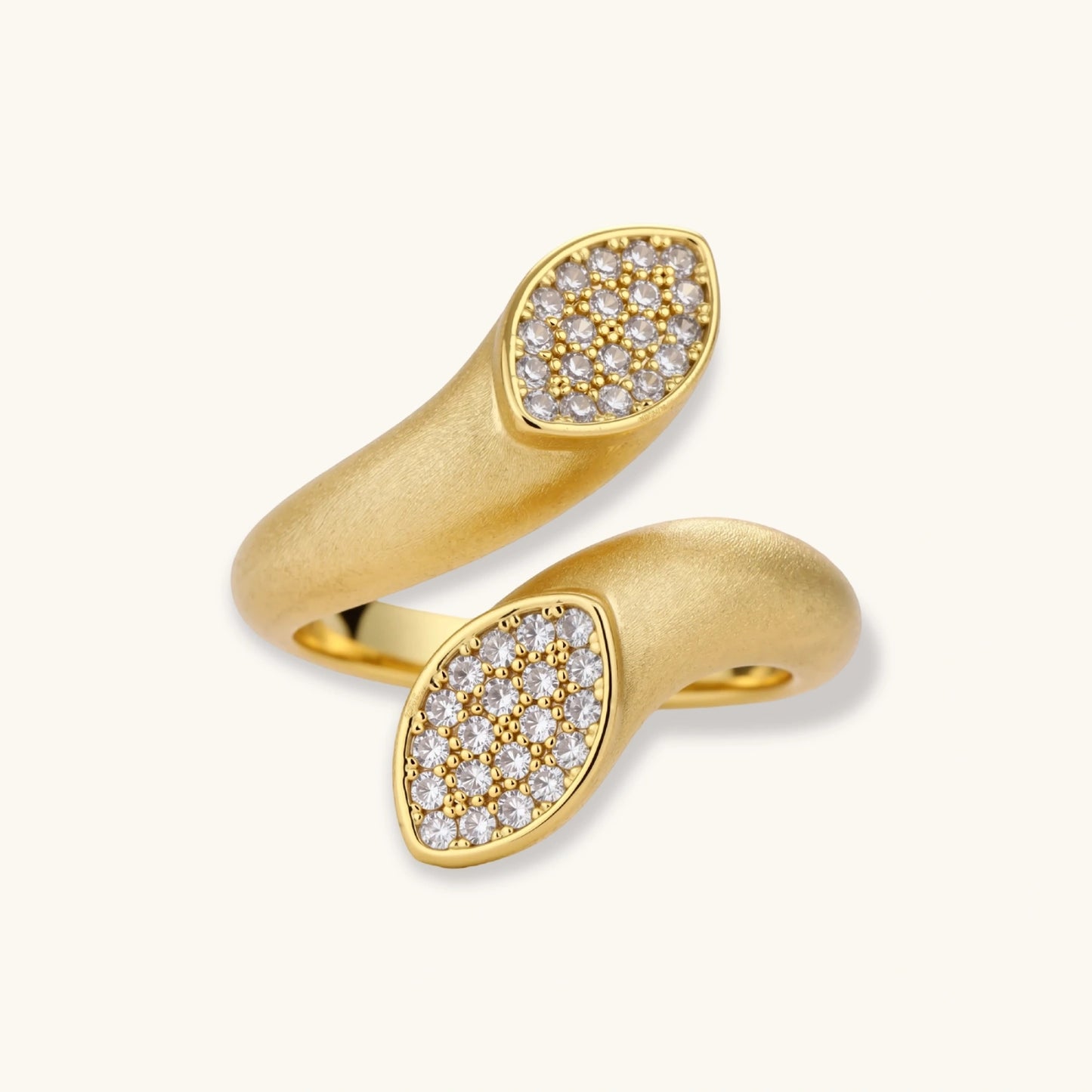 Open-band gold-plated ring with two oval pavé zirconia sections positioned at opposite ends, adjustable design